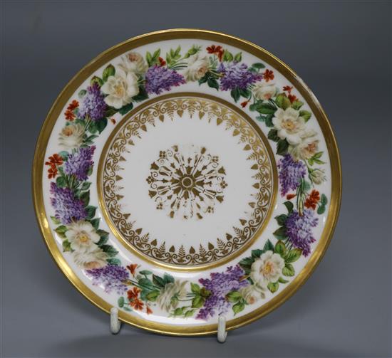 A Sevres saucer decorated with a garland of flowers, dated 1815 diameter 15cm